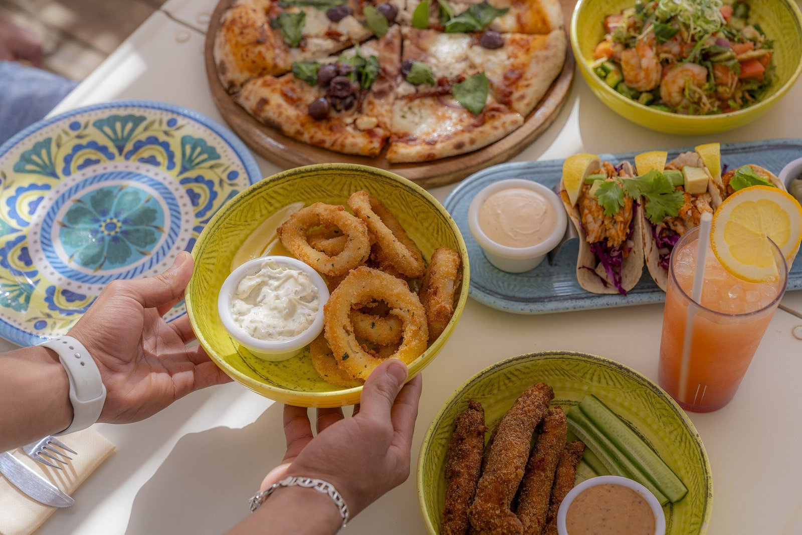 A spread of dishes on a table at a restaurant in Ayla Oasis, Aqaba.