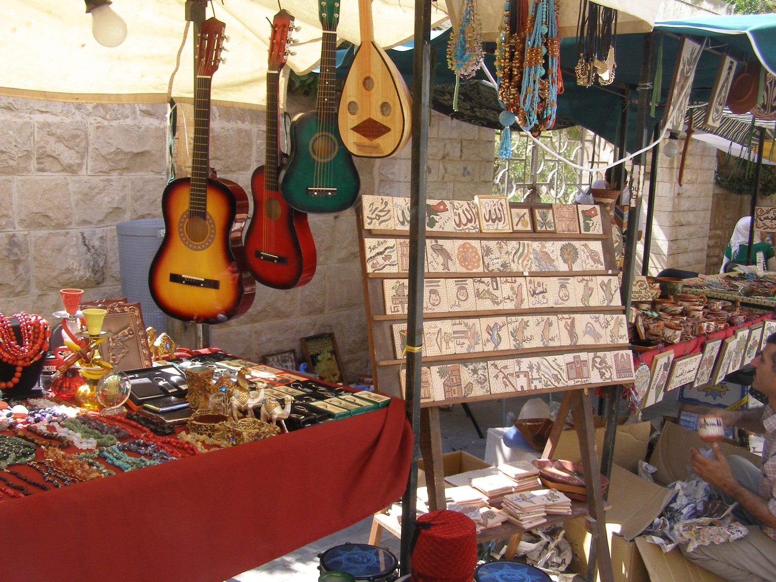 Craft stalls selling textiles, instruments and souvenirs at the Souk Jara street market in Amman.